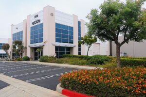 Attractive corporate image industrial building in Central Torrance for lease, built in 2007 featuring 24 feet clear height, 400 amps of power and 27 car parking