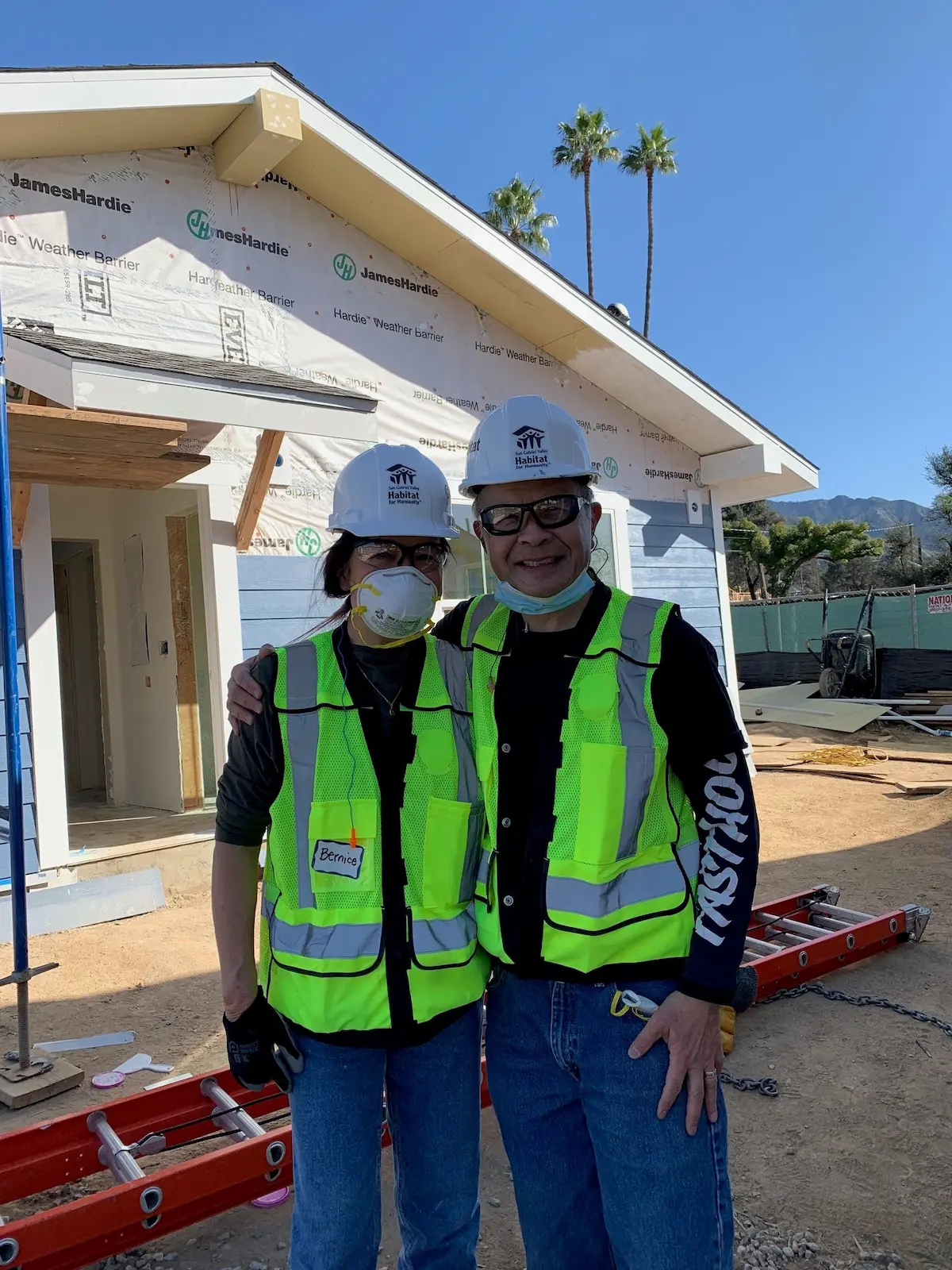 Arnold Ng of Apex Commercial Real Estate and his sister Bernice participating in a house build in Altadena, CA after the Eaton Fire