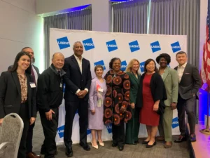 Arnold Ng next to LAEDC Board Chair Ron Frierson, VP Jermaine Hampton, Minal Mondkar of Aura Seating, Keynote speaker Director Tara Lynn Gray of CalOSBA, Stephen Cheung, CEO of LAEDC