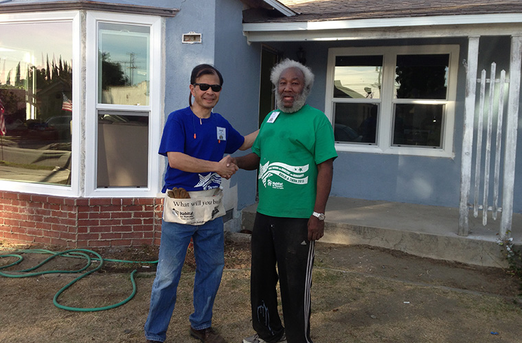 Arnold Ng of Apex volunteering with Habitat for Humanity